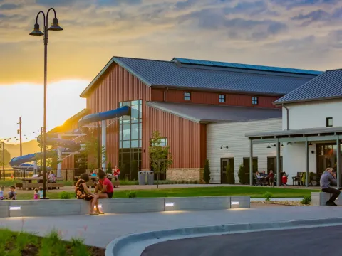 The Berthoud Recreation Center and outdoor waterslide at sunset