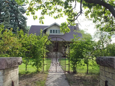 The gated walk to the Gustav and Annie Swanson farmhouse, a 1918 farmstead outside Berthoud